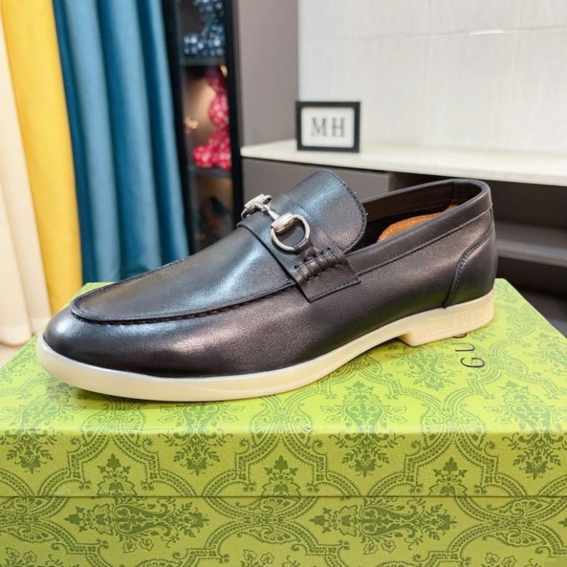 G*u*i leather shoes